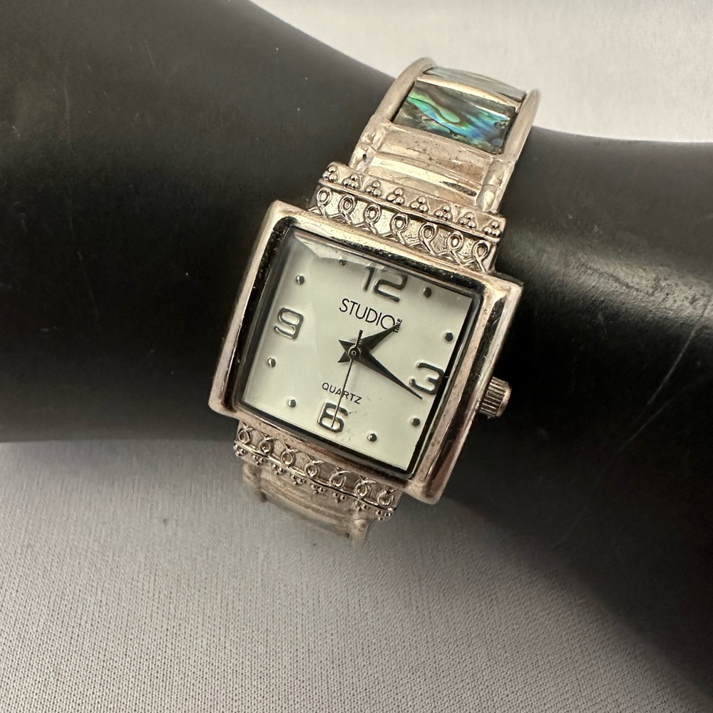 Studio clamper watch with abalone inserts